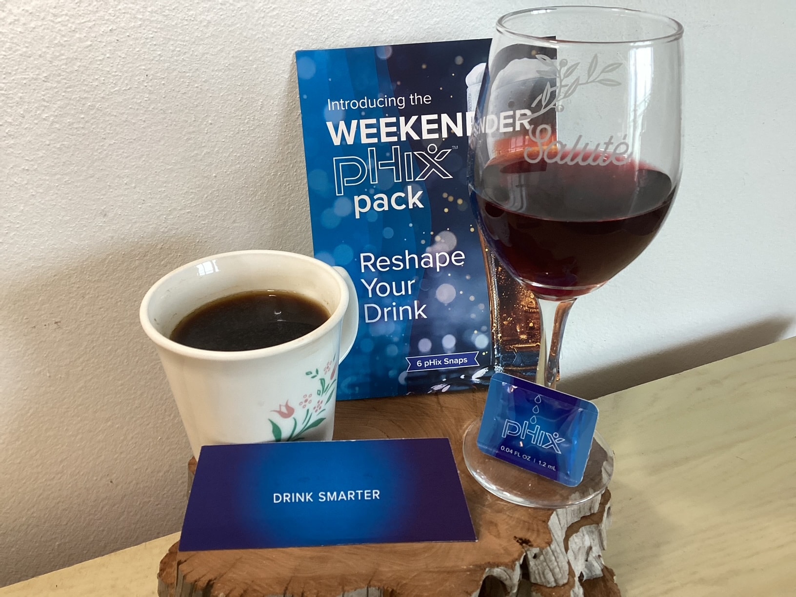 Phix weekender lifestyle — purple flower, wine glass, coffee cup and Phix products