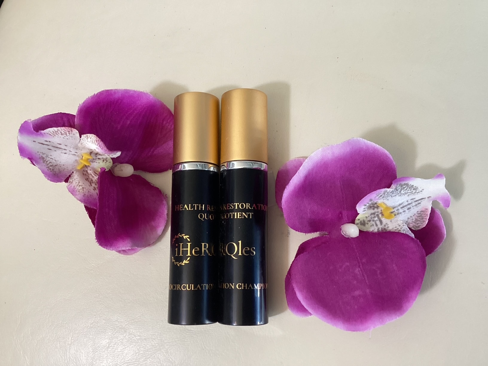 iHerQles spray bottles with purple orchids